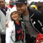 Libby Vanderford gets a hug from Ole Miss Rebel Denzel Nkemdiche.