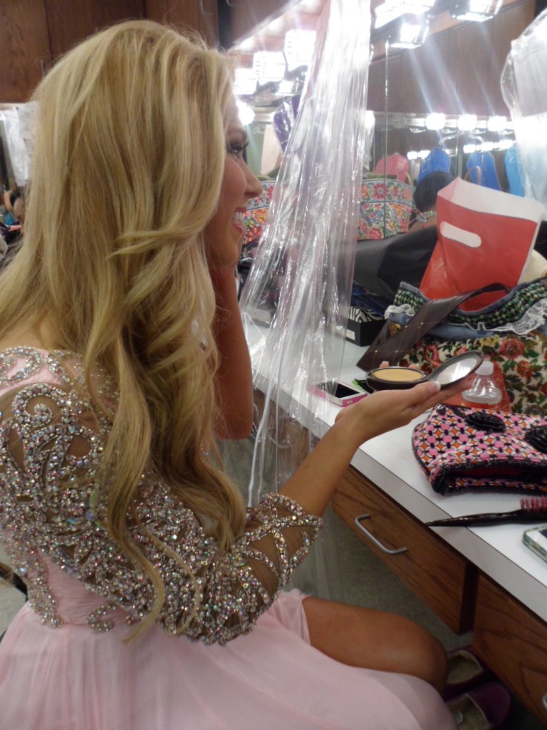 Most Beautiful 2013 Kyndal Hayes touching up her makeup in the dressing room 