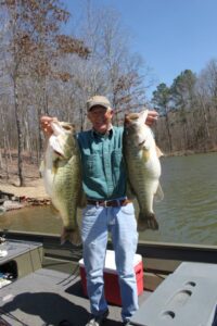 Larry Hurst with lake record bass