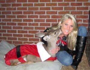 Brittney and her pet deer, Rebel