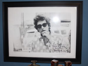 Photo of Bob Dylan backstage in 1965 by Dick Waterman, signed by Dylan