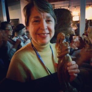 A Mississippi Love Story producer Robbie Fisher with her award for Best Documentary