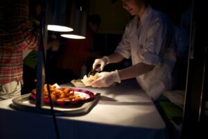 Student serving food