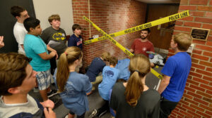 Oxford Middle School students attend a special program presented by UM forensic chemistry faculty. These young students learned about analyzing a crime scene using DNA, toxicology and bullet analysis before having a mock trial.  Photo by Kevin Bain/Ole Miss Communications