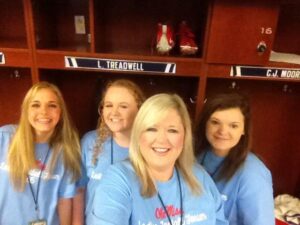 Katherine Puckett (center) and her group members found Laquon Treadwell's locker!