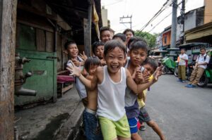 Pasay City, Manila, Philippines - children playing in the streets. Photo by Jenny Adams