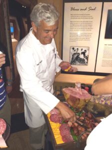 Nick Vergos serves up platters at the Rendezvous table during the 2014 Association of Food Journalists conference in Memphis.