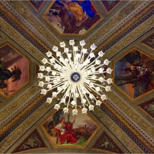 The impressive ceiling and chandelier in Officina Profuma Farmaceutica Santa Maria Novella