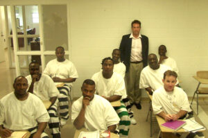 Louis Bourgeois (back), instructor of the Prison Writes Initiative, holds class with inmates at Parchman Penitentiary 
