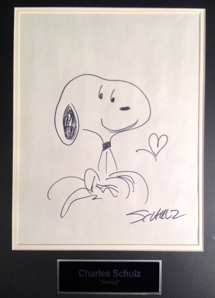 A Charles Schulz Snoopy sketch autographed