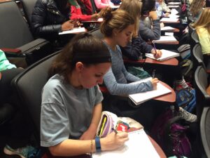 Ole Miss students listen attentively to the three panelists this morning.