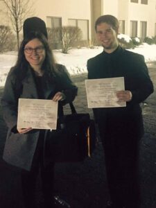 Mississippian Jazz Ensemble guitarist Alicia Vanchuk and trombonist Hunter McGuary with award certificates for “Outstanding Soloist.”