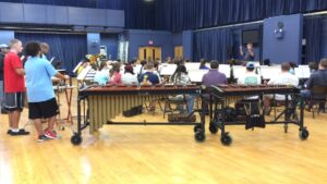 Ole Miss band students listen attentively to DeJournett at rehearsal on March 8.