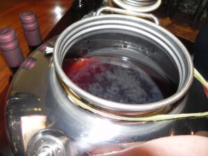 A vat of acute balsamic tradizionale containing "mother of all vinegars," Balsamic.