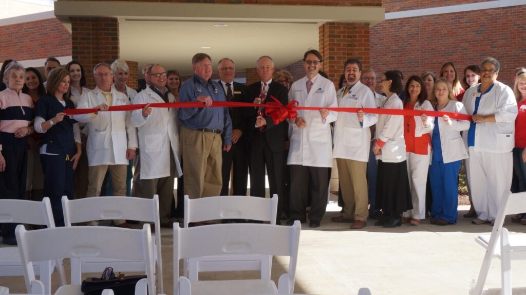 Members of the Baptist North Mississippi staff celebrate the ribbon cutting for the new facility.