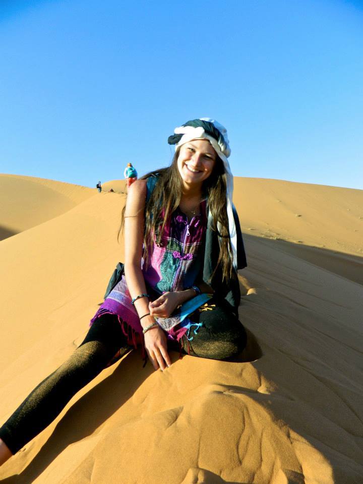 Miller Heiman on top of sand dunes in Morocco.