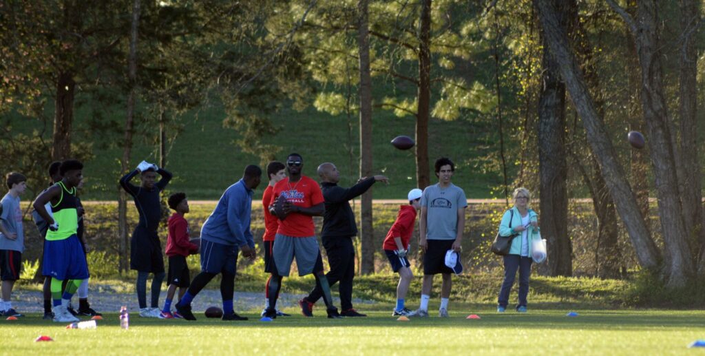 Treadwell taught valuable football skills and wisdom to young athletes. 