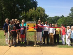 Round Table Book Club cuts the ribbon at Stone Center Park. 