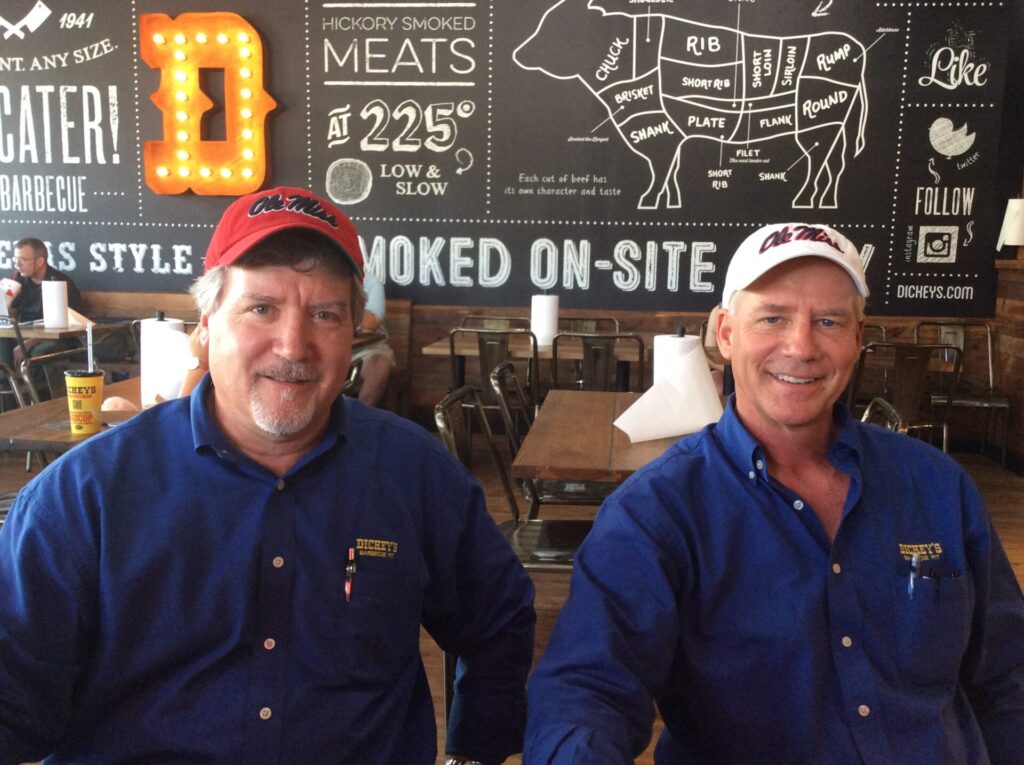 Dickey's Barbecue Pit owners Ray Smith on the left and Jim Rogers on the right. Photo by Liz Foster.