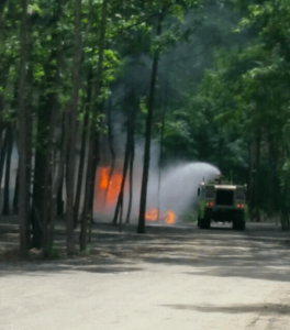 A woman who lives nearby took this photo. She told WBRC TV that she tried to help but the flames were too intense.