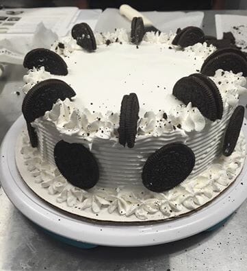 Great American Cookie posted on Facebook: "Our staff is making the Classic Cookies & Cream ice cream cake at Marble Slab Creamery ?? This could be yours tomorrow! ?"