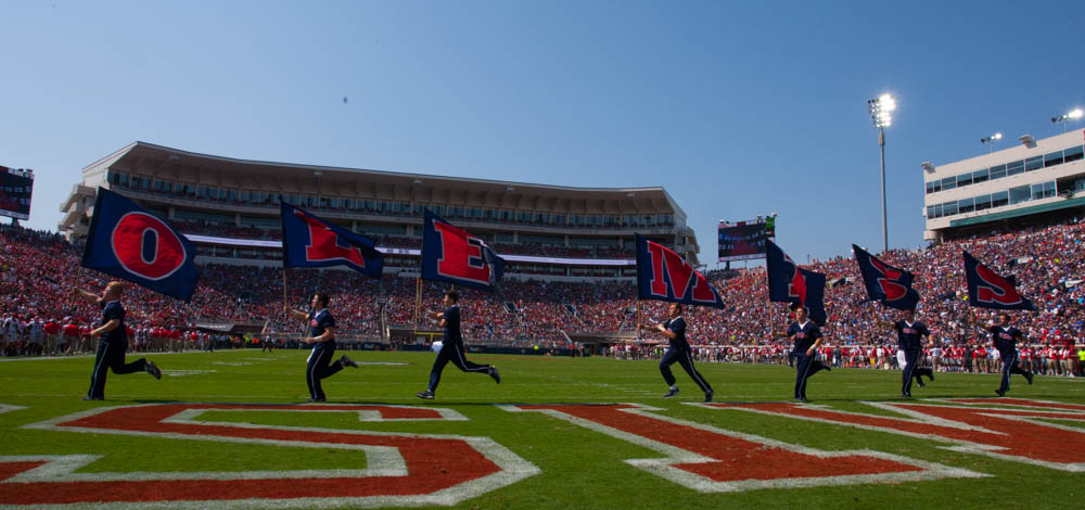 The Ole Miss cheerleaders celebrate another score as the Rebels take on the Georgia Bulldogs Saturday at Vaught-Hemmingway stadium.