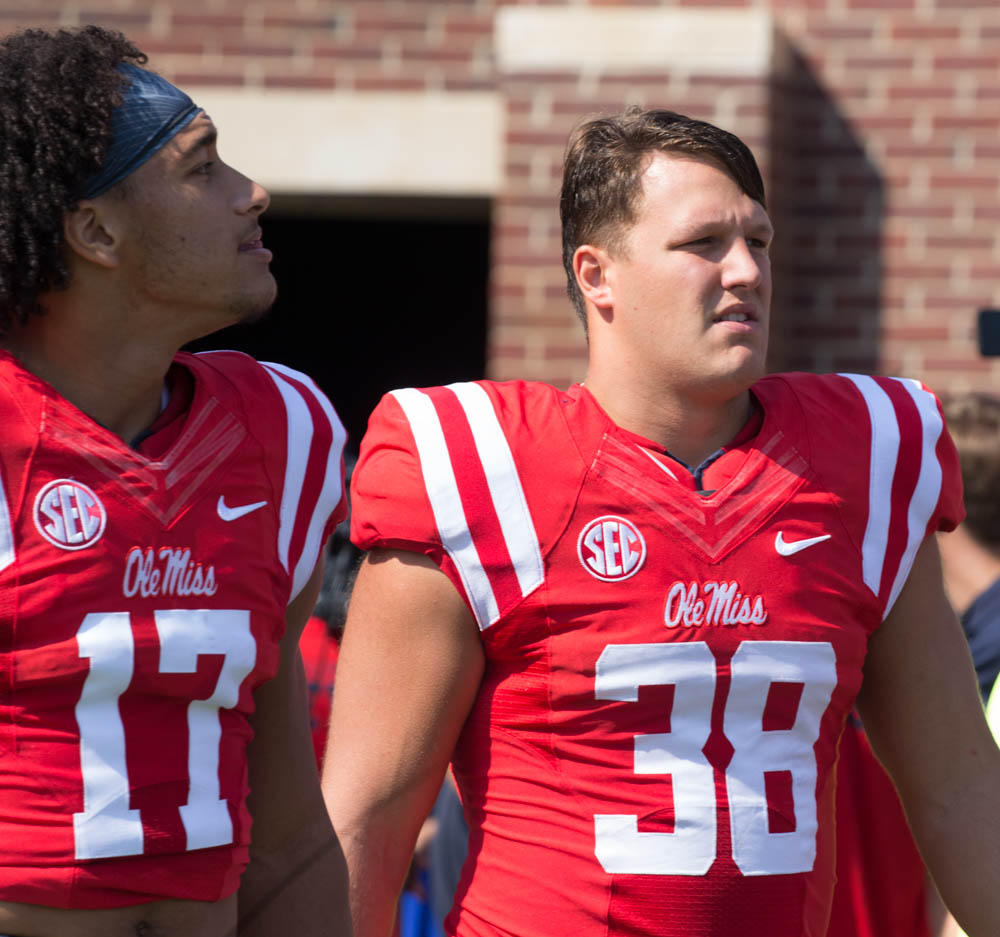 Ole Miss' John Youngblood (38) and Evan Engram (17) come out for the coin toss as the Rebels take on the Georgia Bulldogs Saturday at Vaught-Hemmingway stadium.