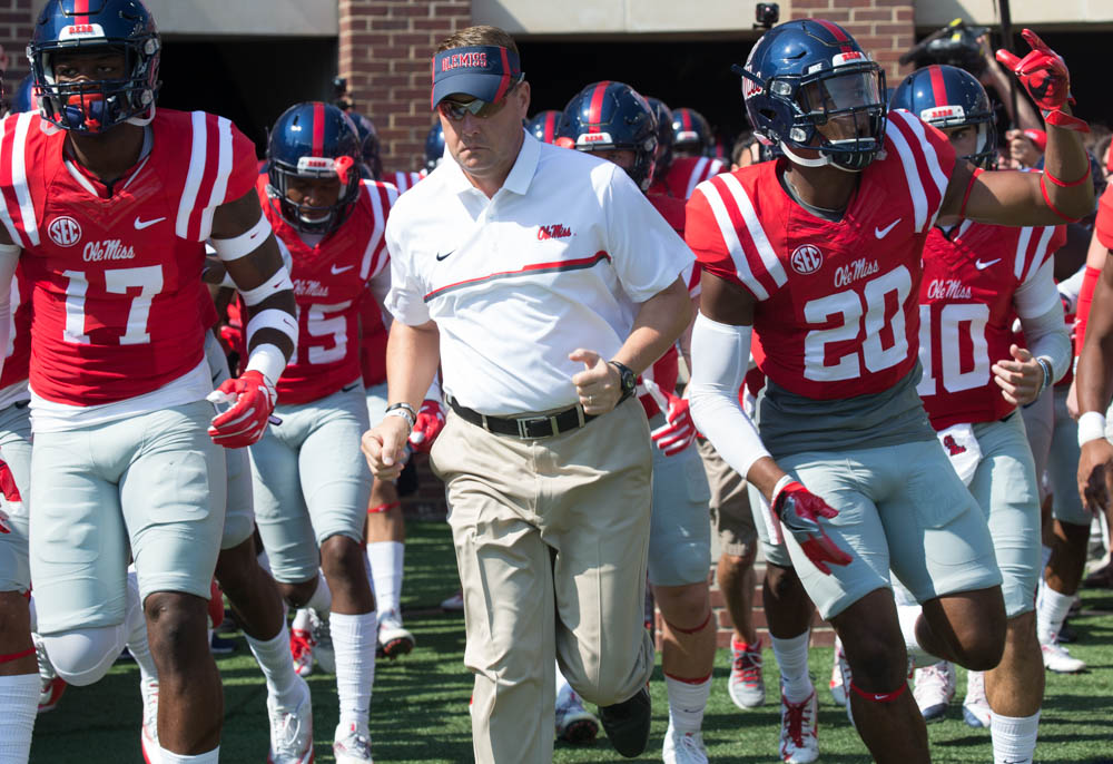 Coach Hugh Freeze leads his team on the field as the Rebels prepare to take the field Saturday taking on the Georgia Bulldogs Saturday at Vaught-Hemmingway stadium. Photo courtesy of Bill Barksdale