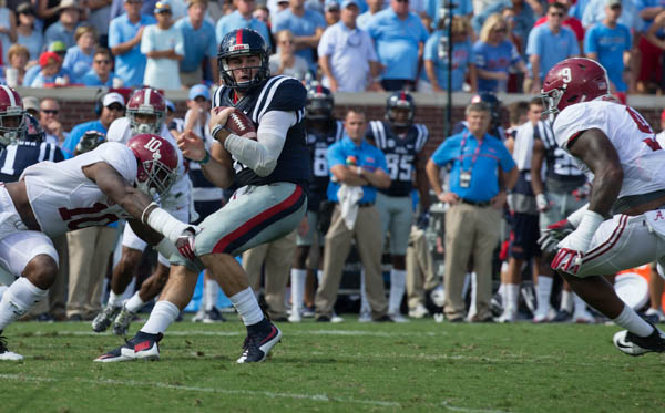Chad Kelly is caught in the backfield by Alabama's Reuben Foster (10) and DaShwan Hand (9) at Vaught-Hemmingway stadium Saturday during the Ole Miss v Alabama game.