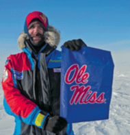 Waters proudly displays his Ole Miss flag at the North Pole.