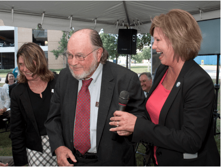 UMMC celebrated the naming of its newest school, the John D. Bower School of Population Health, on September 19. Addressing the crowd are Bower Foundation CEO Anne Travis, left, UMMC professor emeritus Dr. John Bower, and Dr. LouAnn Woodward, vice chancellor for health affairs.