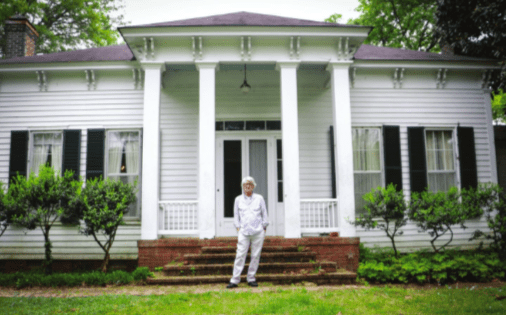 Raymond Doherty in front of his Tupelo house. When he started researching its past, the things he found helped change Chickasaw history. Photography by Ariel Cobbert.