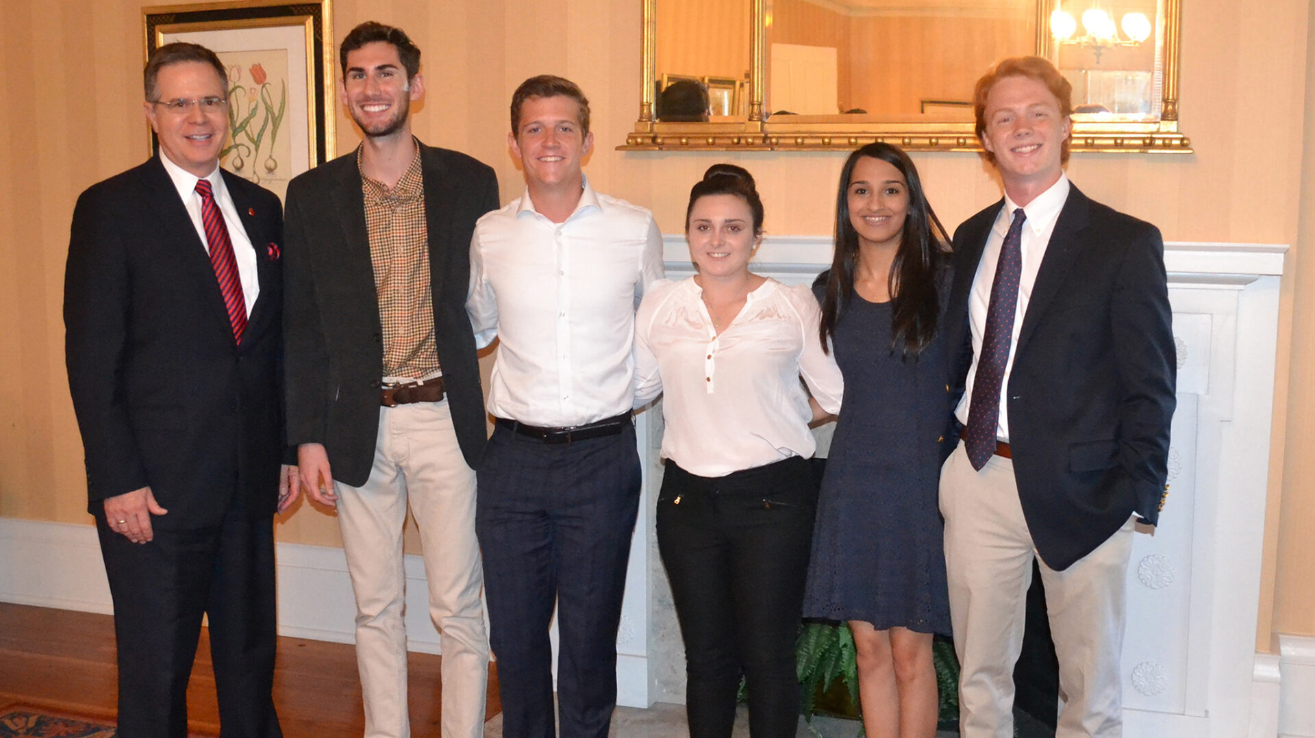 UM students share their experiences from the Washington and New York Internship Experiences program with Chancellor Jeffery Vitter (left) at the Lyceum. Joining Vitter are (from left) Graham White of Biloxi; Harris Ormecher of Austin, Texas; Gabriella Berlanti of Bradenton, Florida; Divya Gosain of Clinton; and Jesse Webb of Atlanta.