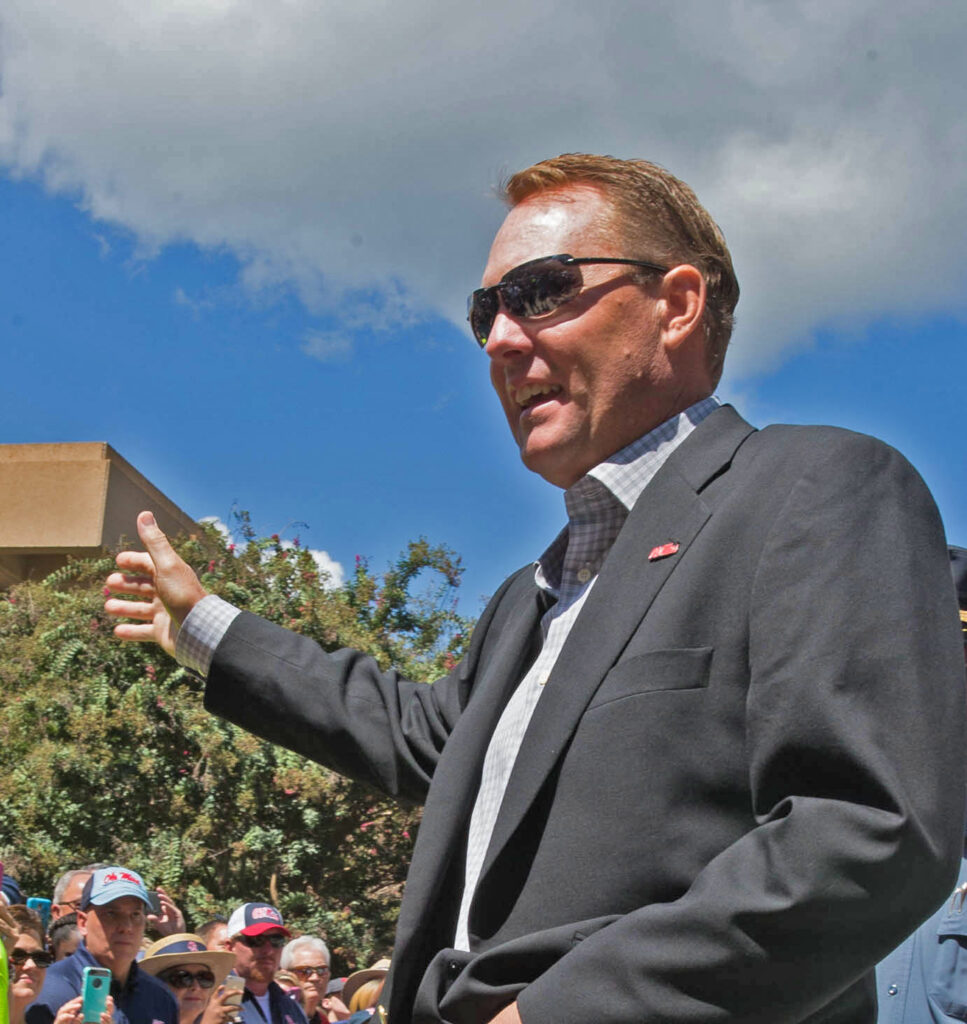 Coach Hugh Freeze steps of the bus as the walk of champions begins in the Grove, Saturday September 12
