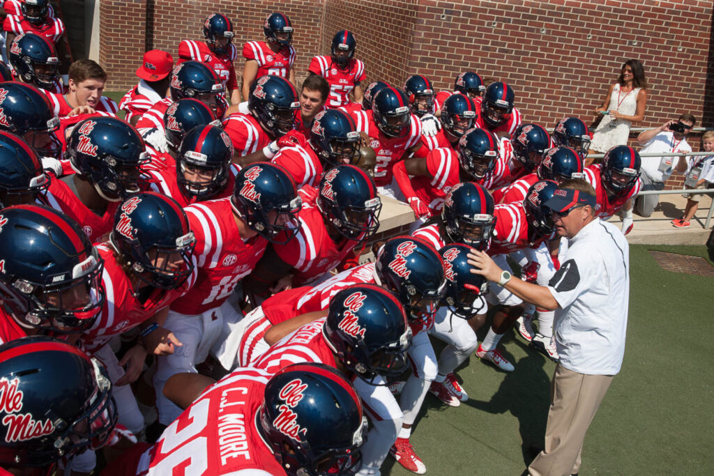 Coach Hugh Freeze fires up the team before taking the field Saturday at Vaught-Hemmingway Stadium.