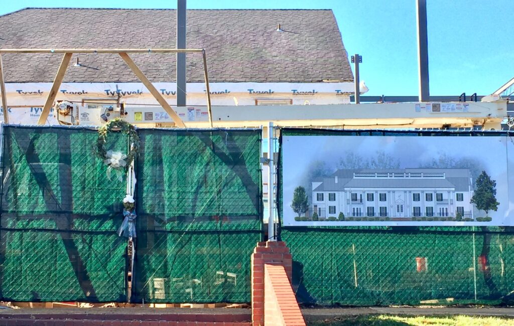 A wreath in memory of senior Raegan Barnhart was placed at the Delta Gamma house under expansion/renovatioon the Ole Miss campus.