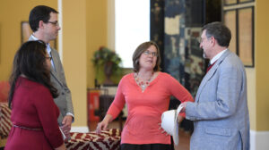 UM Center for Population Studies Director John Green (left) chats with Assistant Professor of Religion Sarah Moses and BMH-NMS Chaplain Director Joe Young during the Medical Humanities students reception.Photo by Thomas Graning/Ole Miss Communications