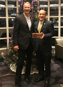 Operation Homefront CEO and President, John I. Pray, Jr. with Ken Ruff, Vice President of national accounts at Beam Suntory after Ken was given a cornerstone award for his work in making Holiday Meals for Military come to life.