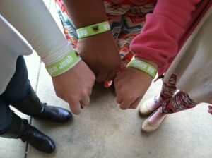 LMS students modeling their 'Be Kind' bracelets. 