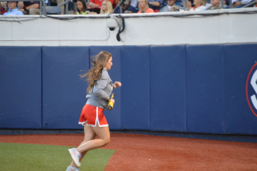 Ole Miss diamond girl going after a foul ball.