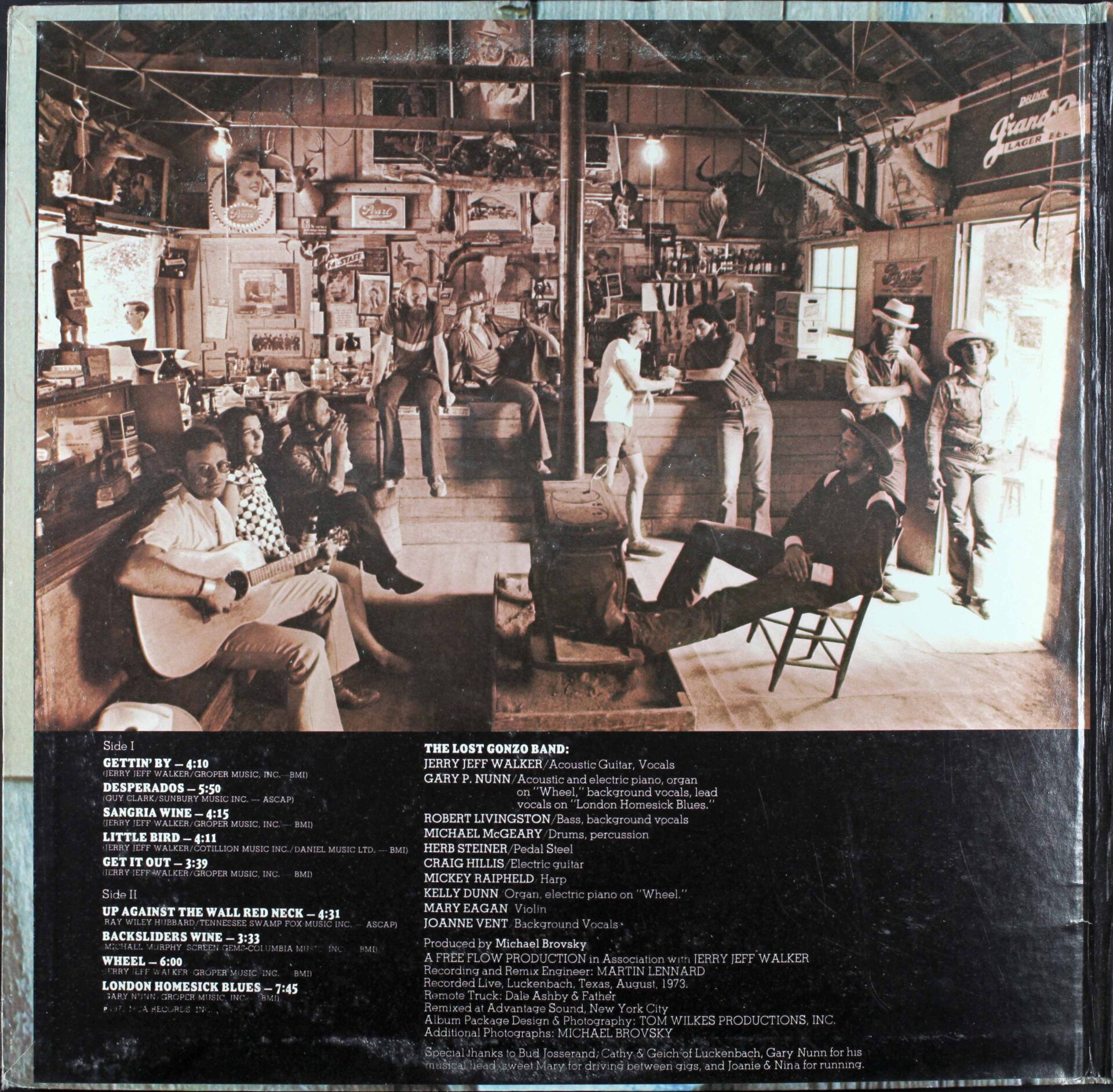 Half the gatefold of ¡Viva Terlingua! Gary P. Nunn seated far left with guitar; Jerry Jeff on the right, kicked back in Luckenbach, Texas.