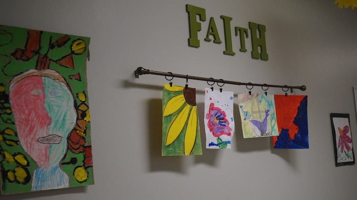 The children have their own art gallery in the church.