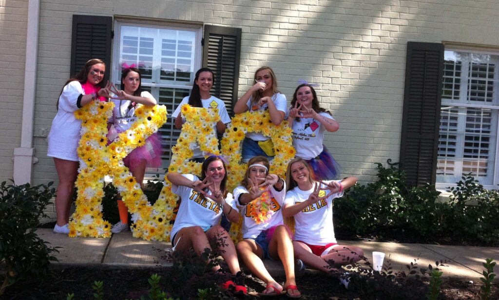 New pledges pose with Kappa Alpha Theta letters