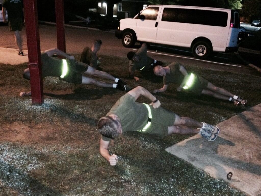 ROTC cadets work out long before sunrise multiple days a week, alternating between strength training and running through campus and Oxford.