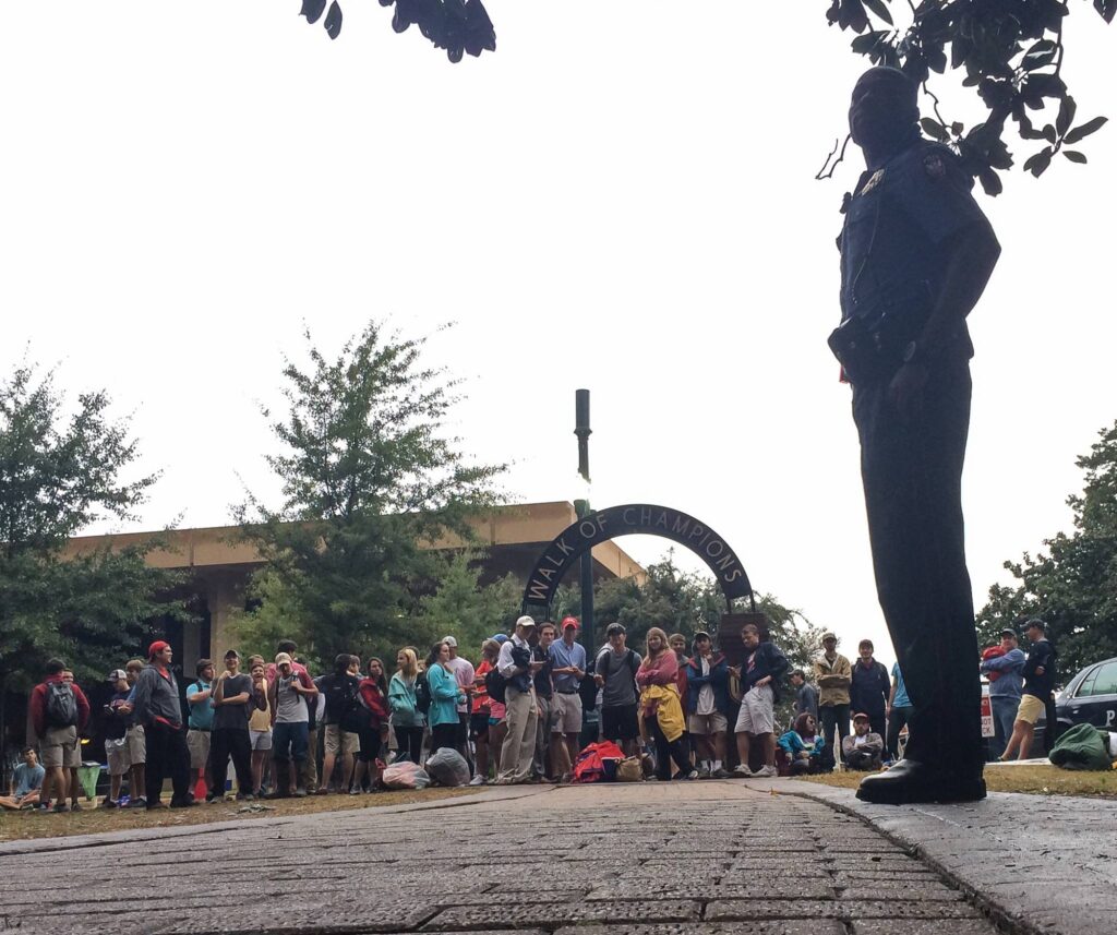 Awaiting the go-ahead from the UPD officer. (photo credit to journalism students Kristen Furr, Shakendra Taylor and Kera Whiteaker) 