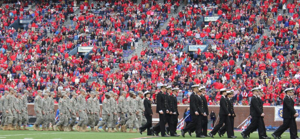 The service people are appreciated at the half-time for the annual Military Appreciation Game. Service people attended the game for free too. 