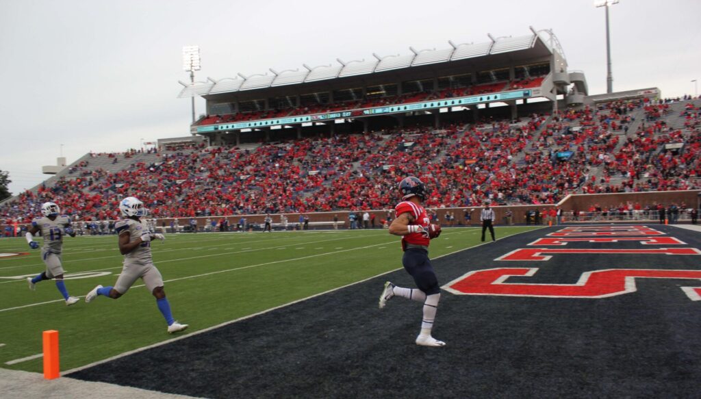 Rebel Jordan Wilkins (RB, #22), carries a TD. He had a great game with 171 rushing yards. 