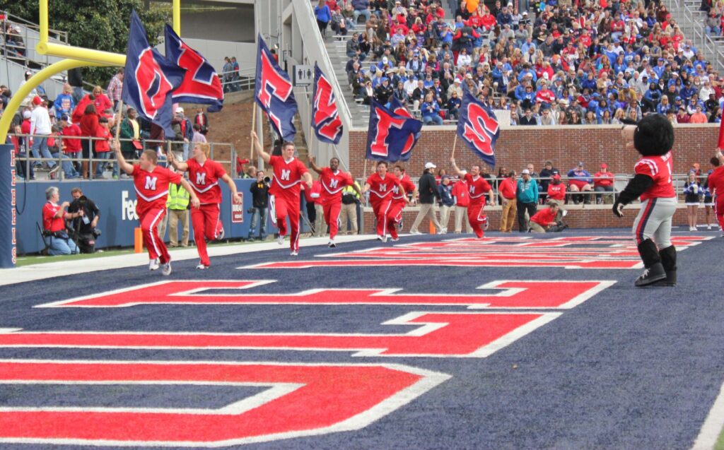 Rebel Bear and cheerleaders celebrate yet another touchdown. 