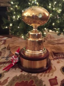 Eddie the Elf turned up at Rebel Co-Offensive Coordinator Matt Luke's home this weekend to snuggle up with the Golden Egg. (Photo courtesy of Ashley Luke)
