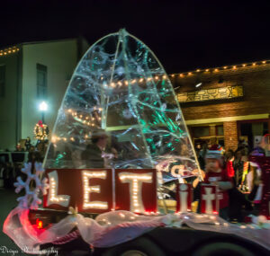 A float from a past Oxford Christmas Parade passes through the square. 